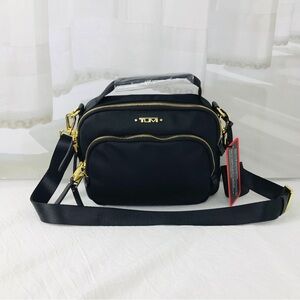 TUMI Black Shoulder Bag with Gold Details